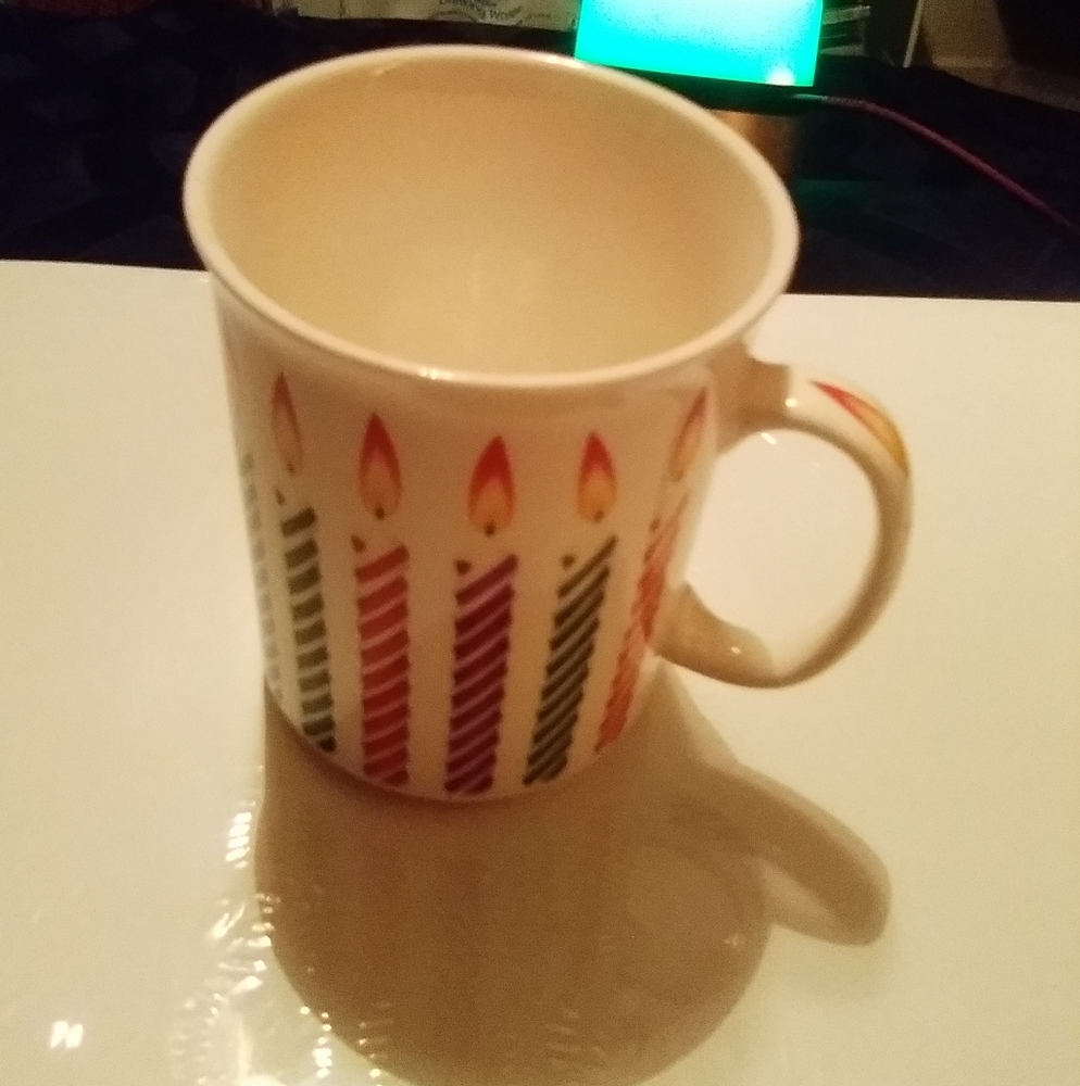Gourmet village birthday candle mug